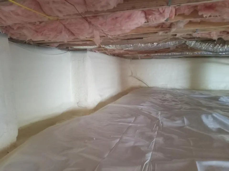 Crawl space encapsulation with closed-cell spray foam for Flat Roof Repair in Papillion